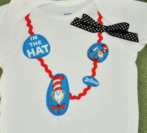 Baby Girl/ Toddler Dr. Seuss bodysuit Dr Suess necklace with  character and words. Cat in the hat black polka dot bow. Girl bodysuit romper.