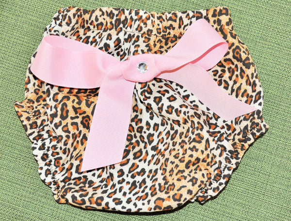 Leopard bloomers / Diaper Cover. Bloomers have big pink bow on back.