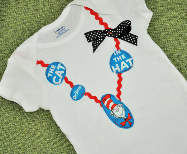 Baby Girl/ Toddler Dr. Seuss bodysuit Dr Suess necklace with  character and words. Cat in the hat black polka dot bow. Girl bodysuit romper.